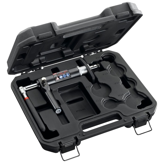 Facom DF_17 manual hydraulic puller kit with multiple attachments in a black hard plastic case, angled view.