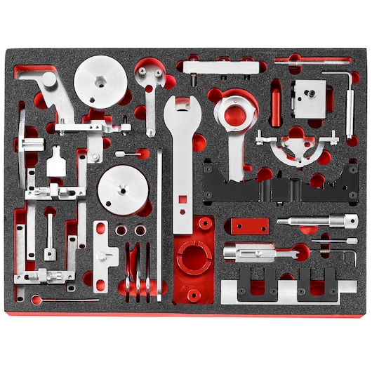 Facom DT.MODFO automotive timing tool kit in foam tray, top-down view, includes assorted metal components.