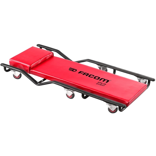 Facom DTS_1B red padded mechanic's creeper with black frame and six caster wheels, side angle on white background.