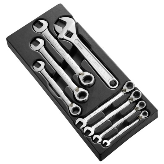 Facom E111100 hand tool set with wrenches and adjustable spanner in black tray, top view.
