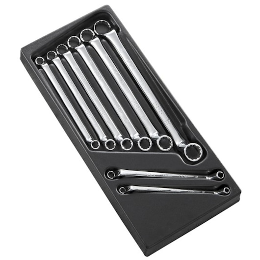 Facom E111710 box-end wrench set in black tray, top angle, eight silver wrenches arranged by size.