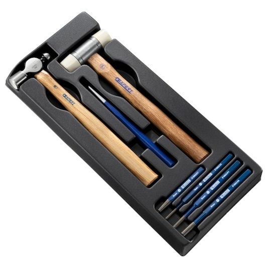 Facom E150803 hammer and punch set with wooden handles and blue punches in black tray, top angle.