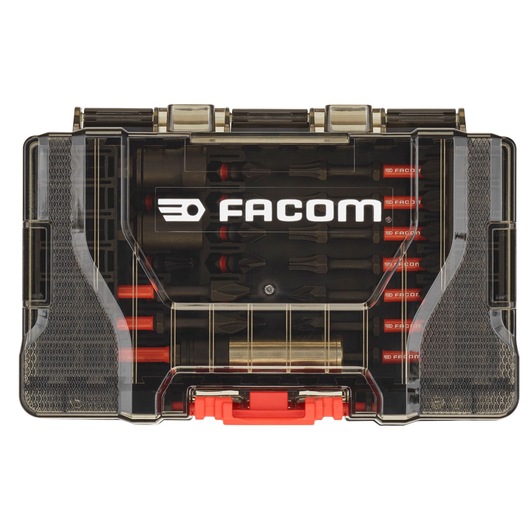 Facom branded transparent hard plastic case containing multiple screwdriver bits and accessories. The case has a visible logo and a red latch.