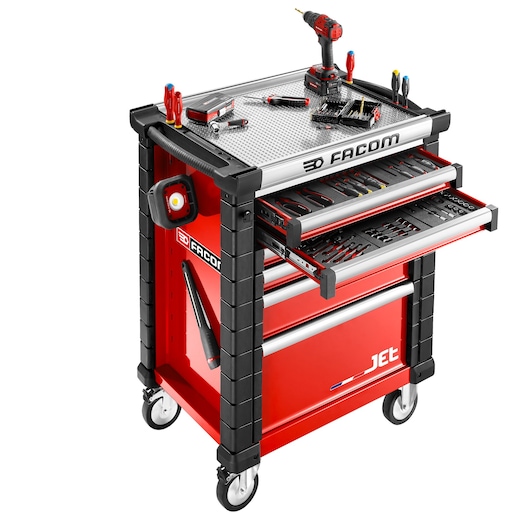 Facom JET.6M3A red tool trolley with open drawers, assorted tools, side lamp, and drill, front angle.