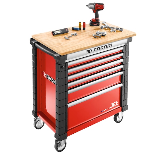 Facom JET.6M4A red tool cabinet with six drawers, wood top, tools and accessories, front angle, white background.