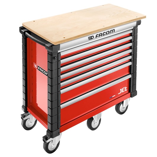 Facom JET.7M5A red tool cabinet with seven drawers, wood top, and wheels, front angle.