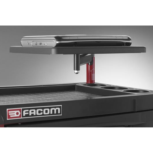 Facom JET_A3 tool trolley upper tray with black laptop on raised shelf, side view on white background.
