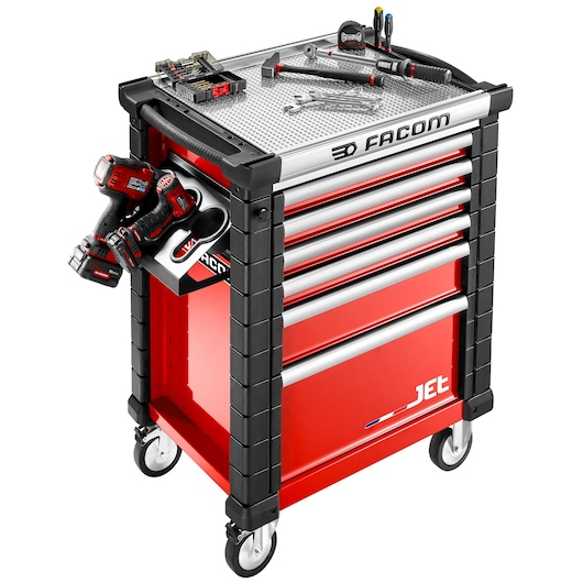 Facom JET.LA19 red and black rolling tool cabinet with seven drawers, tools on top, side drill holders, studio angle.