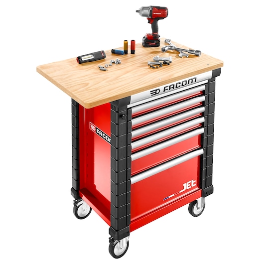 Facom JET.WA14M4 red rolling tool cabinet with wood top, drawers, power tool, and sockets, front angle.