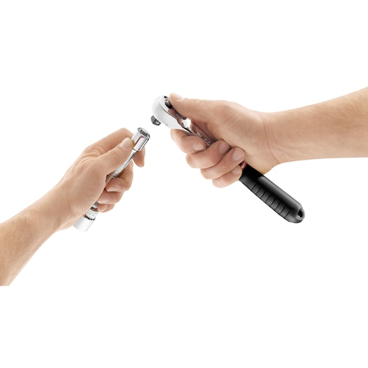 Facom JL_171 ratchet handle and socket held in hands, product photography, white background, side angle