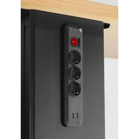 Facom JLS3-PSHPOWER power strip with three sockets, red switch, and two USB ports mounted on black cabinet, side angle.
