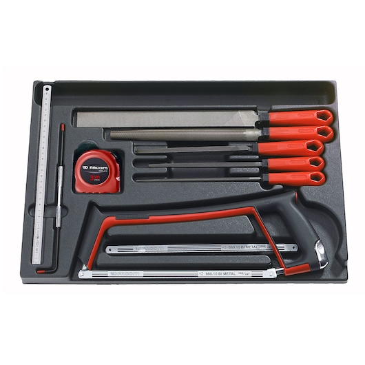 Facom MOD_601 hand tool set with red handles, including files, hacksaw, tape measure, and ruler, top view.