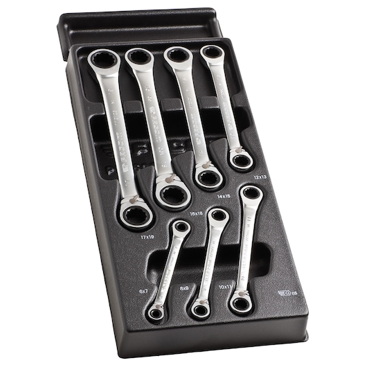 Facom MOD.65J7PB ratcheting wrench set in black tray, top angle, seven silver wrenches in various sizes.