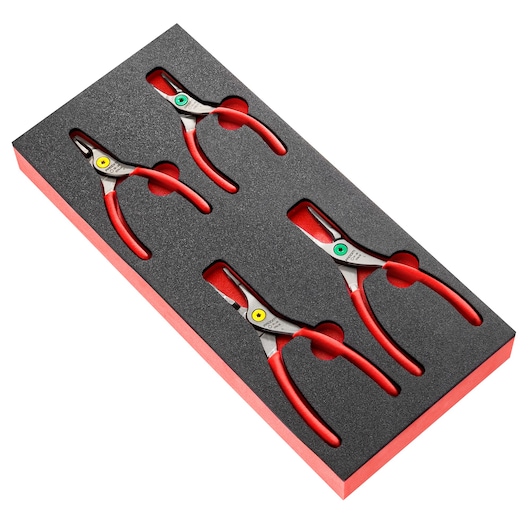 Facom MODM.PCSNPB photography of four red-handled pliers in black foam tray, angled view, tool set.
