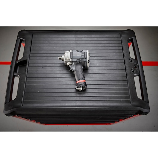 Facom NS.3100GPB impact wrench on black toolbox, photographed from above.