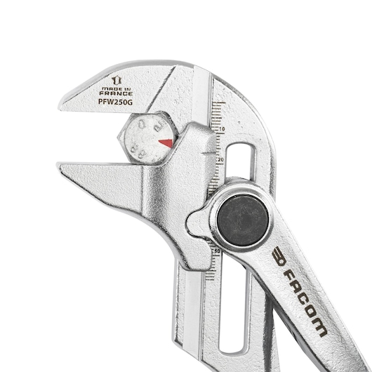 Photo of Facom PWF250G adjustable wrench, silver finish with measurement scale and dial, angled on white background.