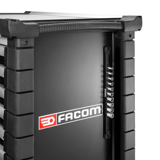 Photo of Facom tool cabinet R.40EGRPPB, black with visible side sockets and Facom logo, front angle.