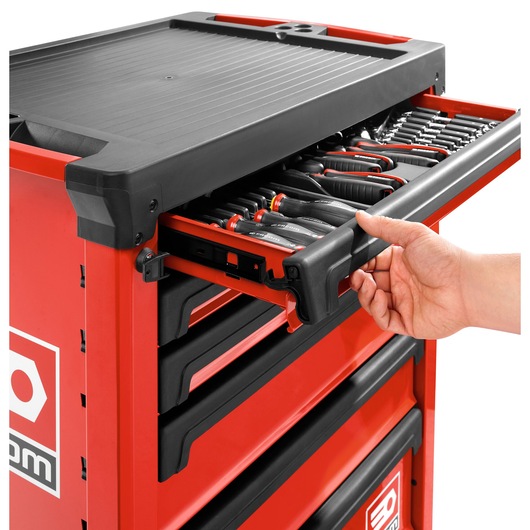 Photo of Facom ROLL.6M3APB red tool trolley with open drawer showing organized hand tools, side angle.