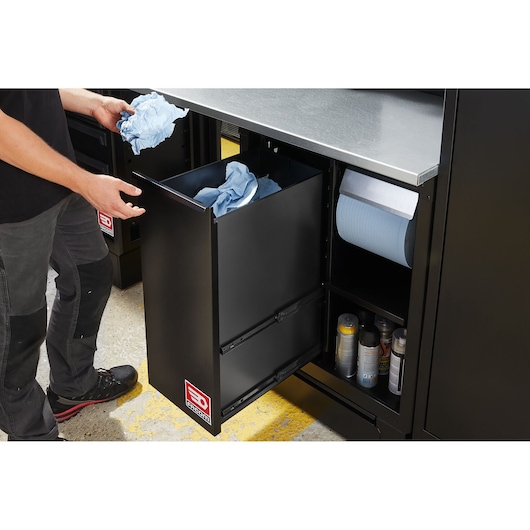 Facom black cabinet RWS2-MBSERBS, front angle, open drawer with blue cloths and cleaning supplies.