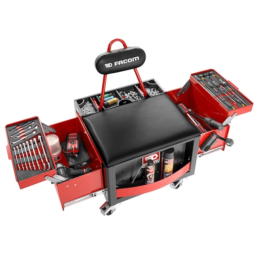 Facom TCS-P1 red rolling tool chest with cushioned seat, open drawers showing tools and accessories, front angle.