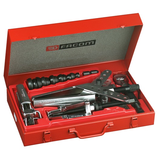 Photo of Facom U_103A bearing puller set with multiple components in a red metal case, photographed from above.