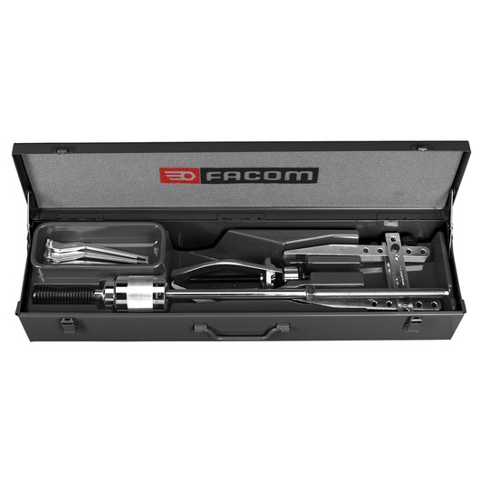 Photo of Facom U_306J1 bearing puller tool set in open black metal case, showing organized chrome and steel components.