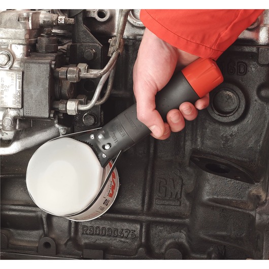 Facom U_46ACL oil filter wrench with red and black handle shown in use on engine part.
