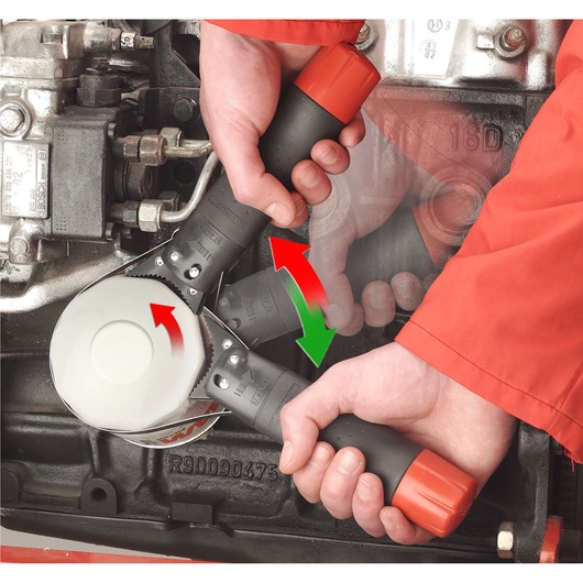 Facom U_46ACL adjustable oil filter wrench used by hands on engine part, red and black handles.