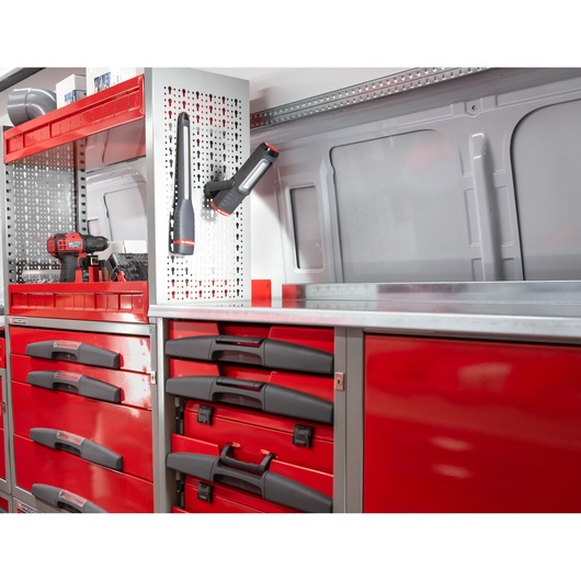 Facom U50020056 red and grey workshop storage drawers and pegboard with tools, photo of organized tool station.