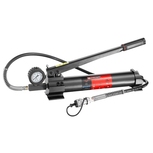 Facom UWP_10MA black and red hydraulic hand pump with pressure gauge, side view on white background.