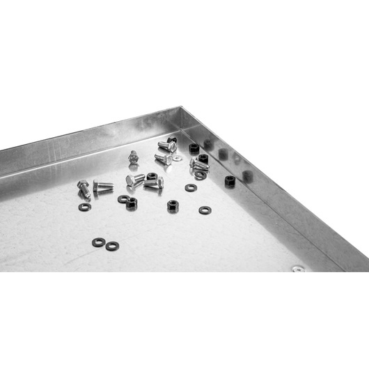 Facom WB2.1500GS metal workbench surface with assorted bolts, nuts, and washers, corner angle, white background.