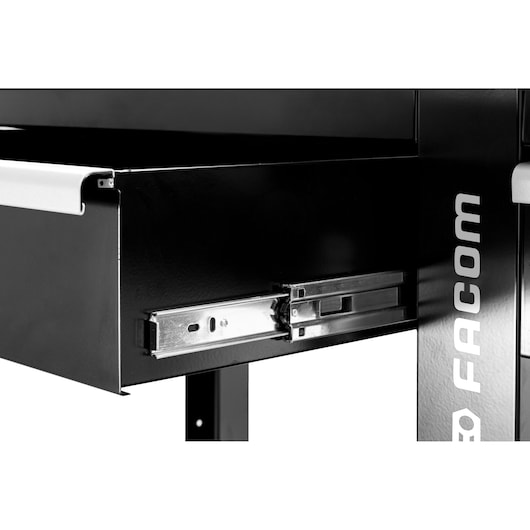 Facom WB2.2000W tool storage drawer, black metal with silver handle, close-up on sliding mechanism, angled view.