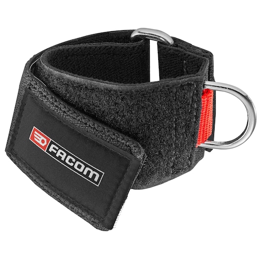 Facom WRT-DSLS black adjustable wrist strap with Velcro closure, red loop, and metal D-rings, front angle.
