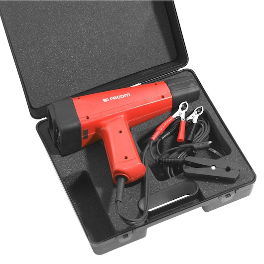 Facom X730B timing light with cables and clamps in black carrying case, photography, top view.