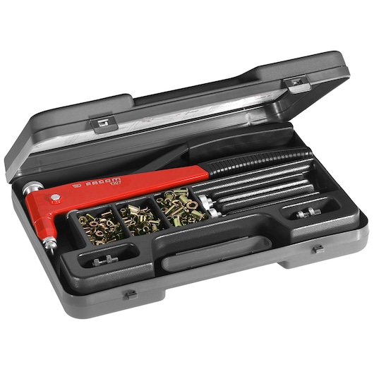 Facom Y_M46 rivet gun kit with red tool, assorted rivet nuts, rods, in open black carrying case, angled view.